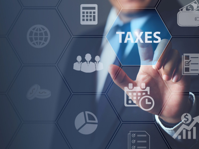 Businessman using innovative virtual touchscreen presses taxes button.with icons state taxes.Data analysis,paperwork,financial research,report.Calculation tax return surrounding.taxes Concept