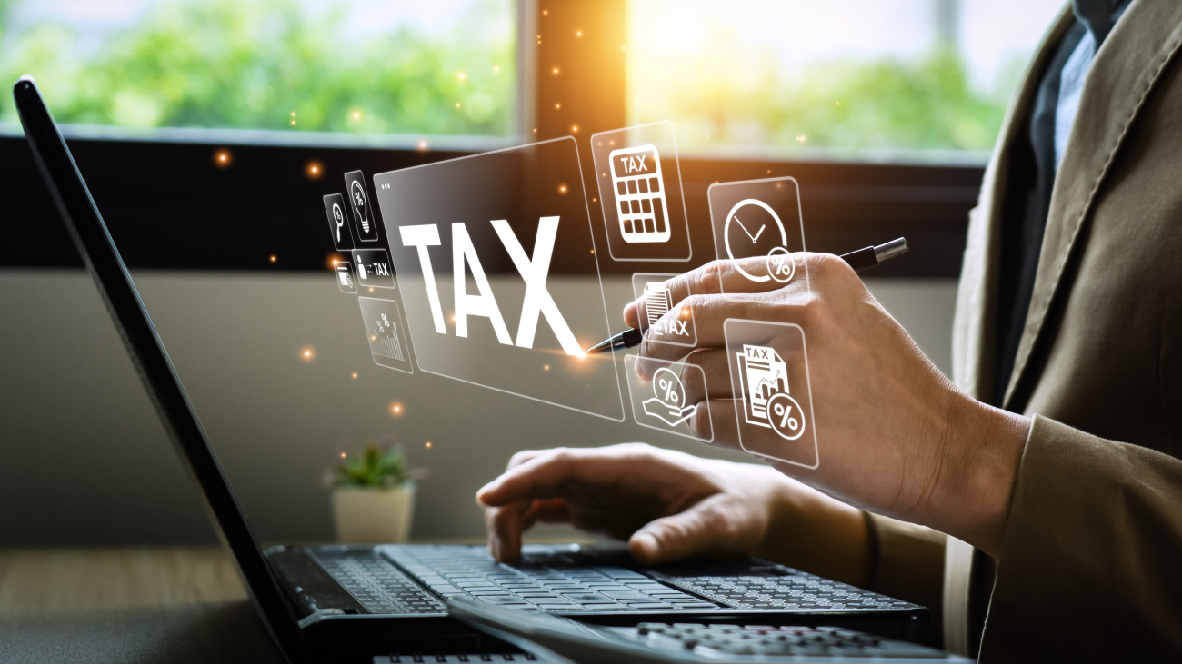 Tax deduction planning concept. Businessman calculating business balance prepare tax reduction. taxes paid by individuals and corporations such as VAT, income tax and property tax.